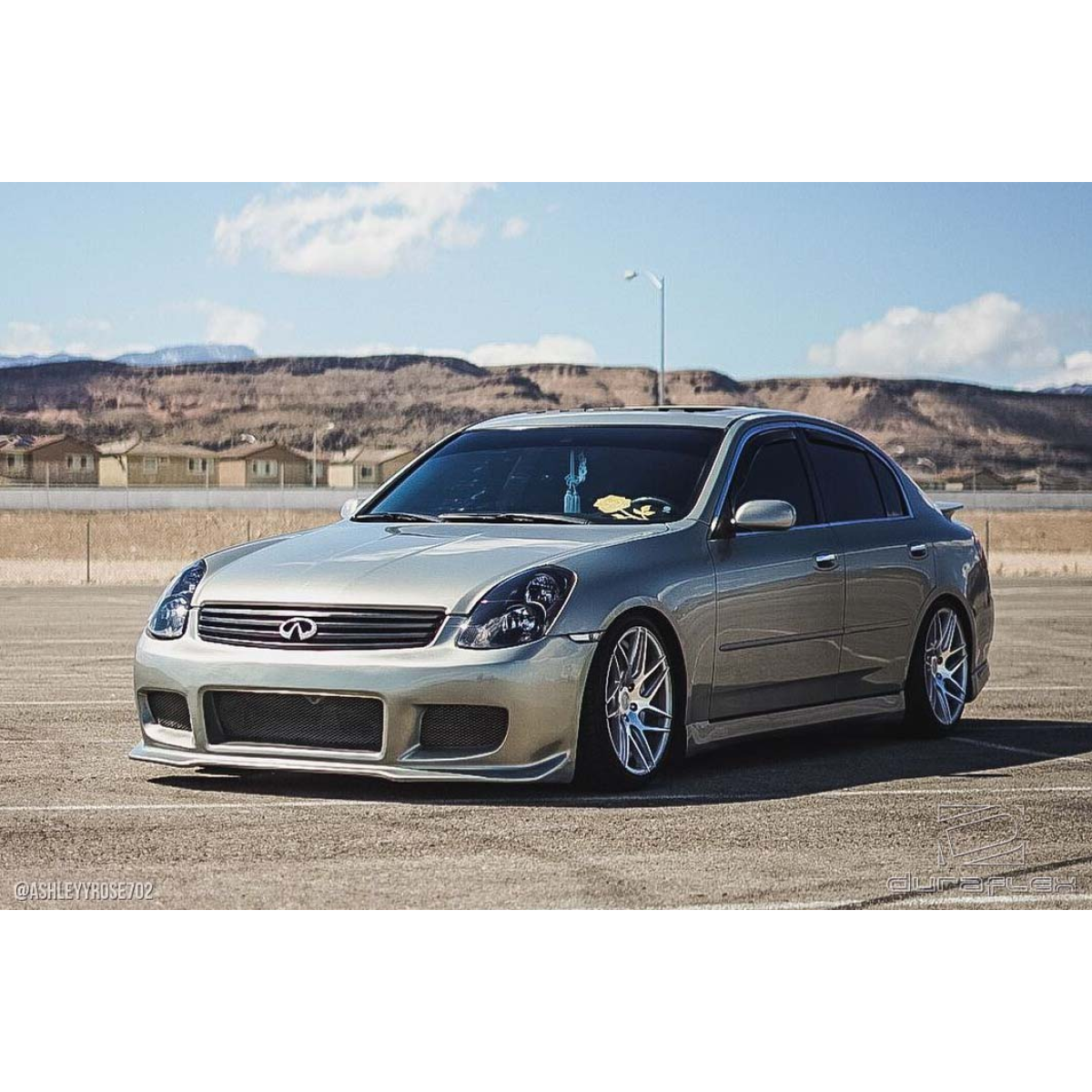 Modify your Infiniti G35 2003 with our Exterior/Front Bumpers or Lips - Front angle view of the vehicle