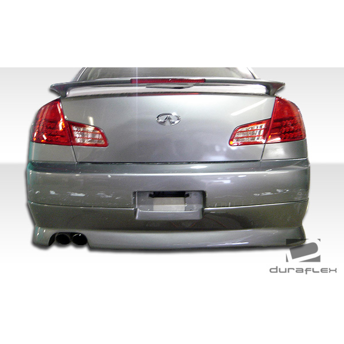 Modify your Infiniti G35 2003 with our Exterior/Complete Body Kits - Rear view angle of the car part