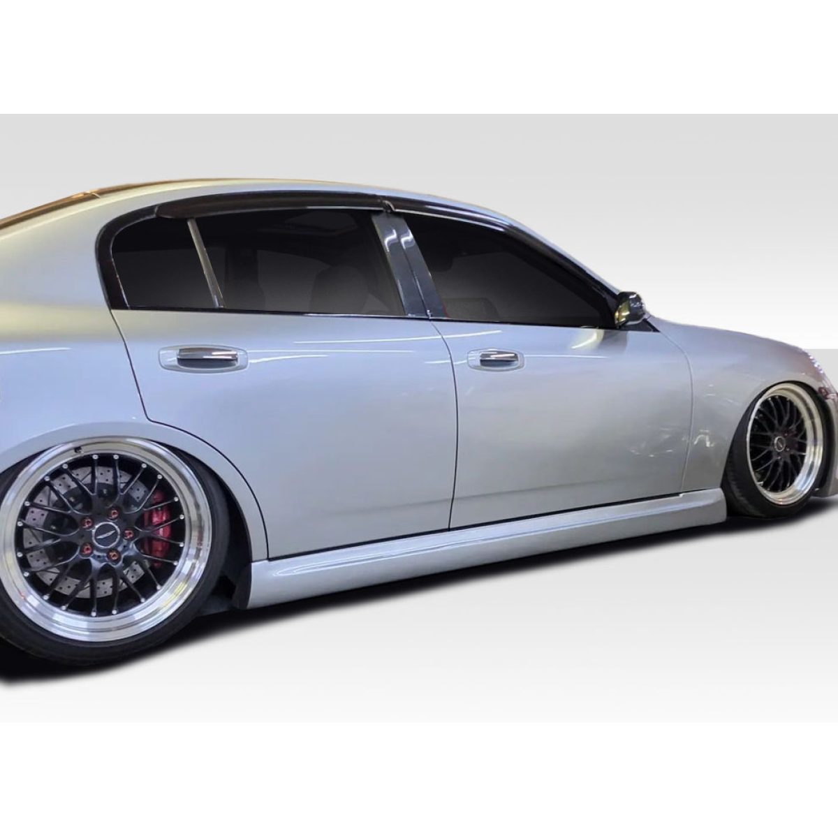 Modify your Infiniti G35 2003 with our Exterior/Side Skirts - Side profile view of the car from a low angle