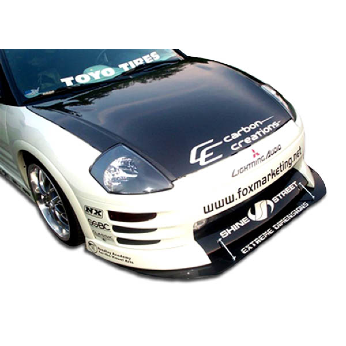 Modify your Mitsubishi Eclipse 2003 with our Exterior/Front Bumpers or Lips - Viewed from above and slightly front angle