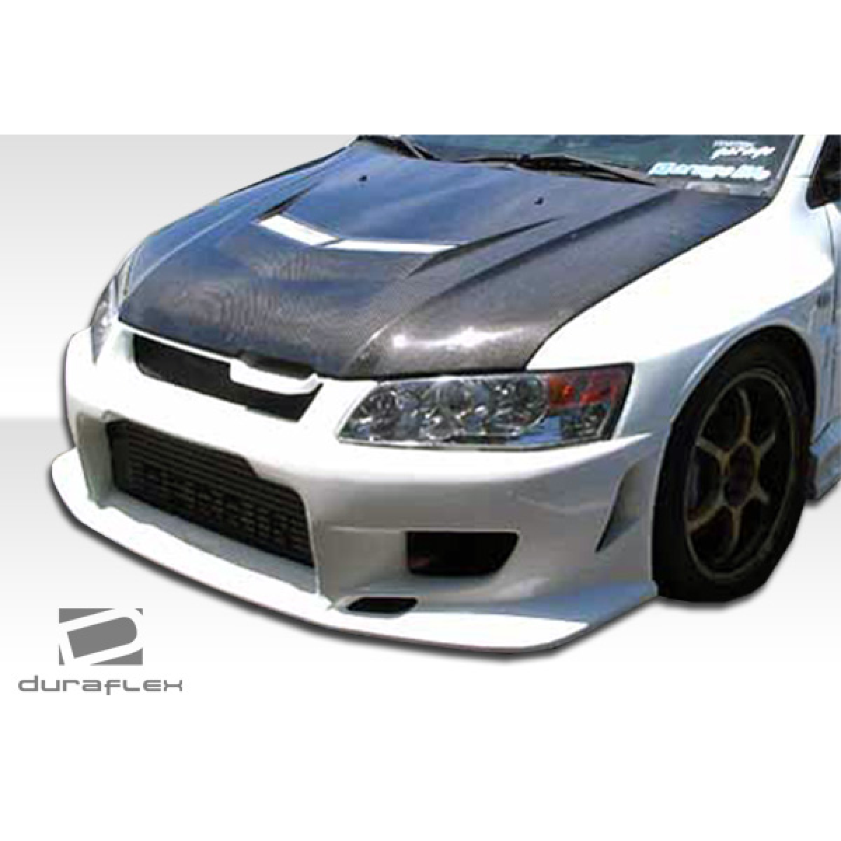 Modify your Mitsubishi Evolution 2003 with our Exterior/Front Bumpers or Lips - Front view at a slight upward angle