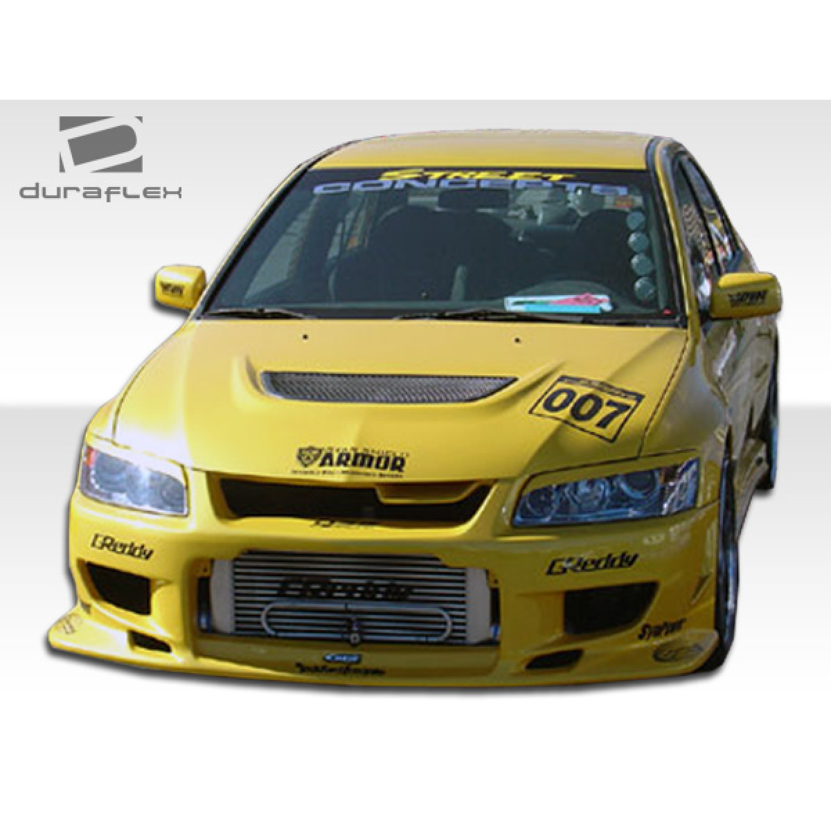 Modify your Mitsubishi Evolution 2003 with our Exterior/Front Bumpers or Lips - Front view of a modified yellow sports car