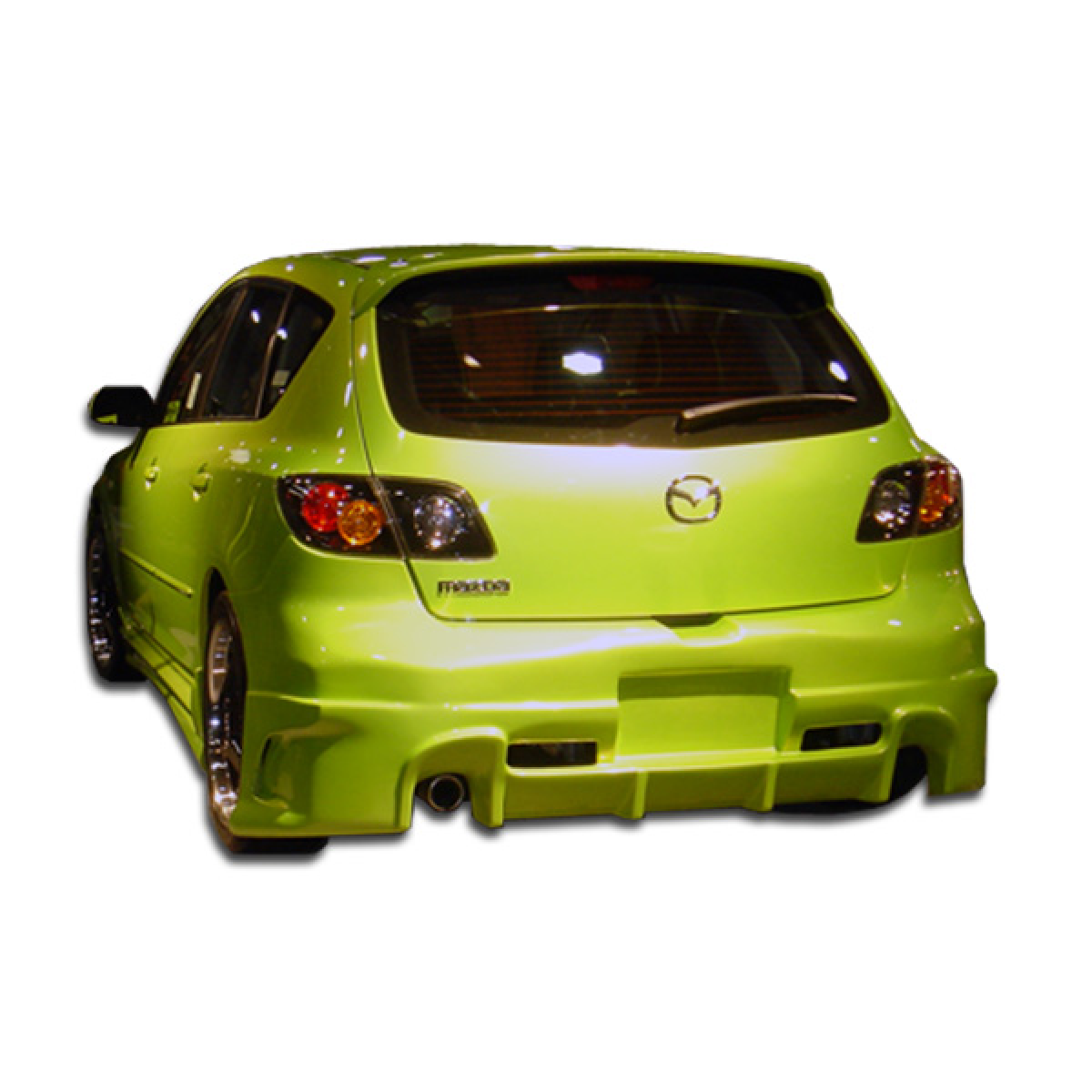 Modify your Mazda 3 2004 with our Exterior/Rear Bumpers or Lips - Rear angle view of Mazda 3 showcasing bumper design