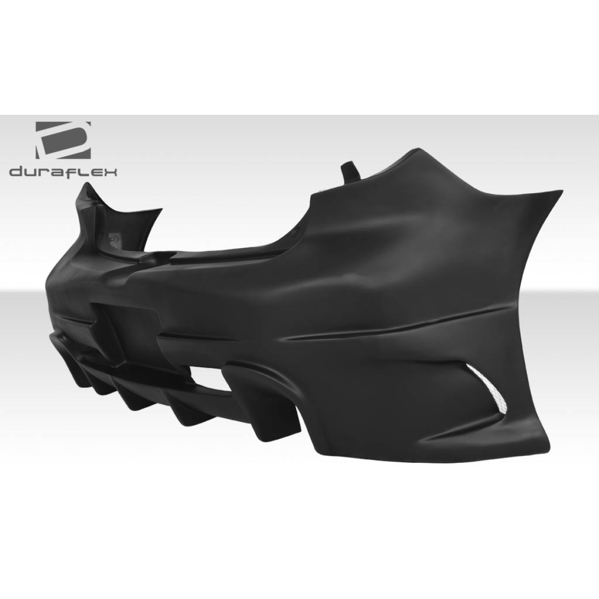 Modify your Mazda 3 2004 with our Exterior/Rear Bumpers or Lips - The angle shows the rear bumper side view