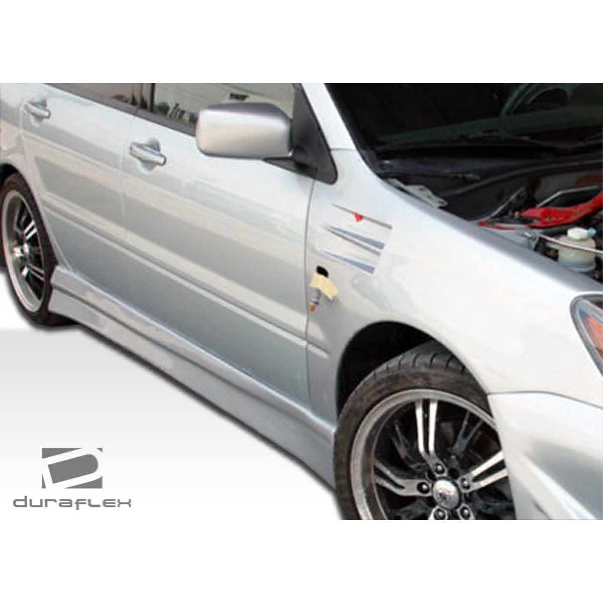 Modify your Mitsubishi Lancer 2004 with our Exterior/Complete Body Kits - Side angle view of side skirts on Lancer