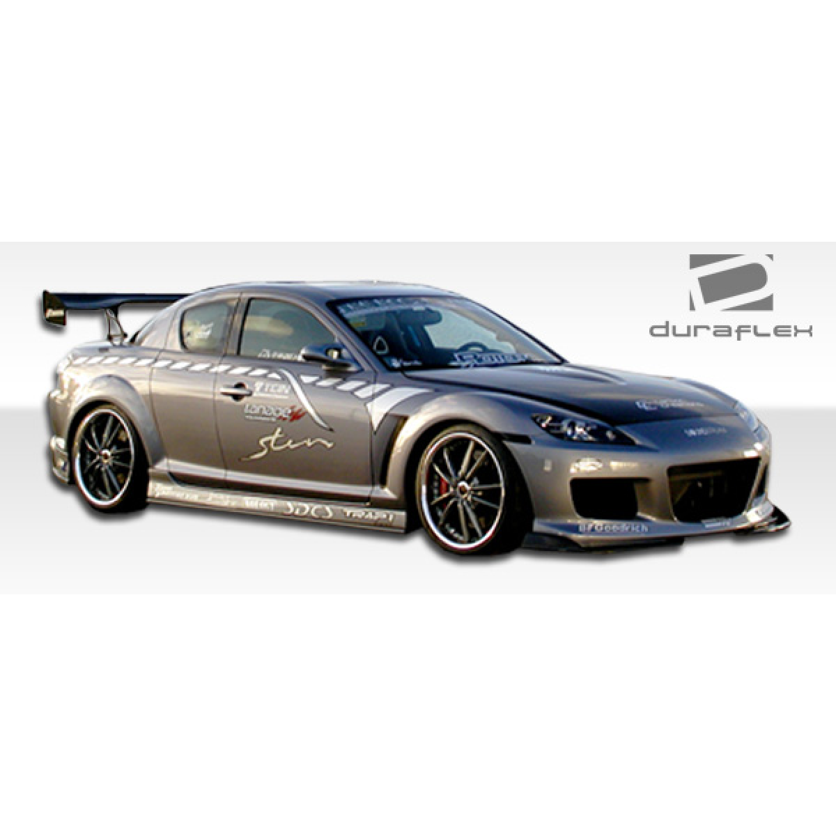 Modify your Mazda RX-8 2004 with our Exterior/Side Skirts - Side view at an angle showcasing the vehicle's design