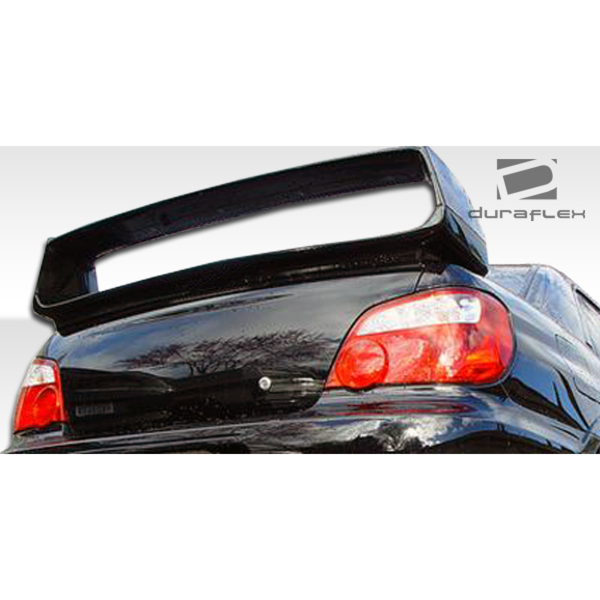 Modify your Subaru Impreza 2002 with our Exterior/Wings - Rear view of a wing on a black Subaru Impreza