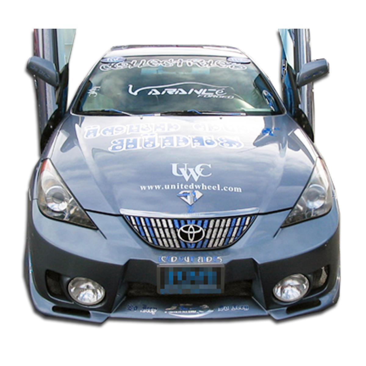 Modify your Toyota Solara 2004 with our Exterior/Front Bumpers or Lips - Front view with upward angles on doors