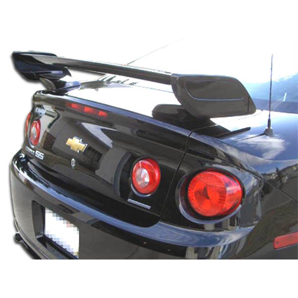 Modify your Chevrolet Cobalt 2005 with our Exterior/Wings - Rear view angle showing spoiler of the vehicle