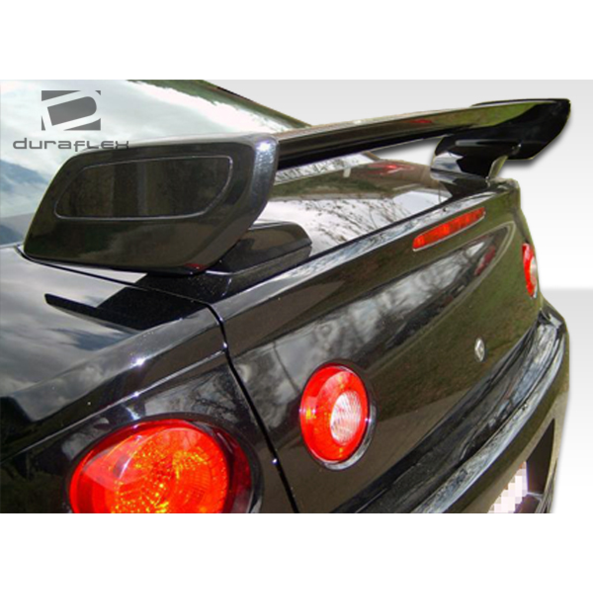 Modify your Chevrolet Cobalt 2005 with our Exterior/Wings - Rear view angle showing the car spoiler