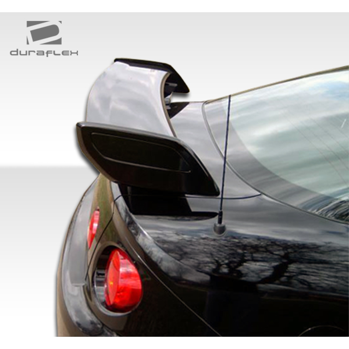 Modify your Chevrolet Cobalt 2005 with our Exterior/Wings - Rear view of wing spoiler at a slight angle