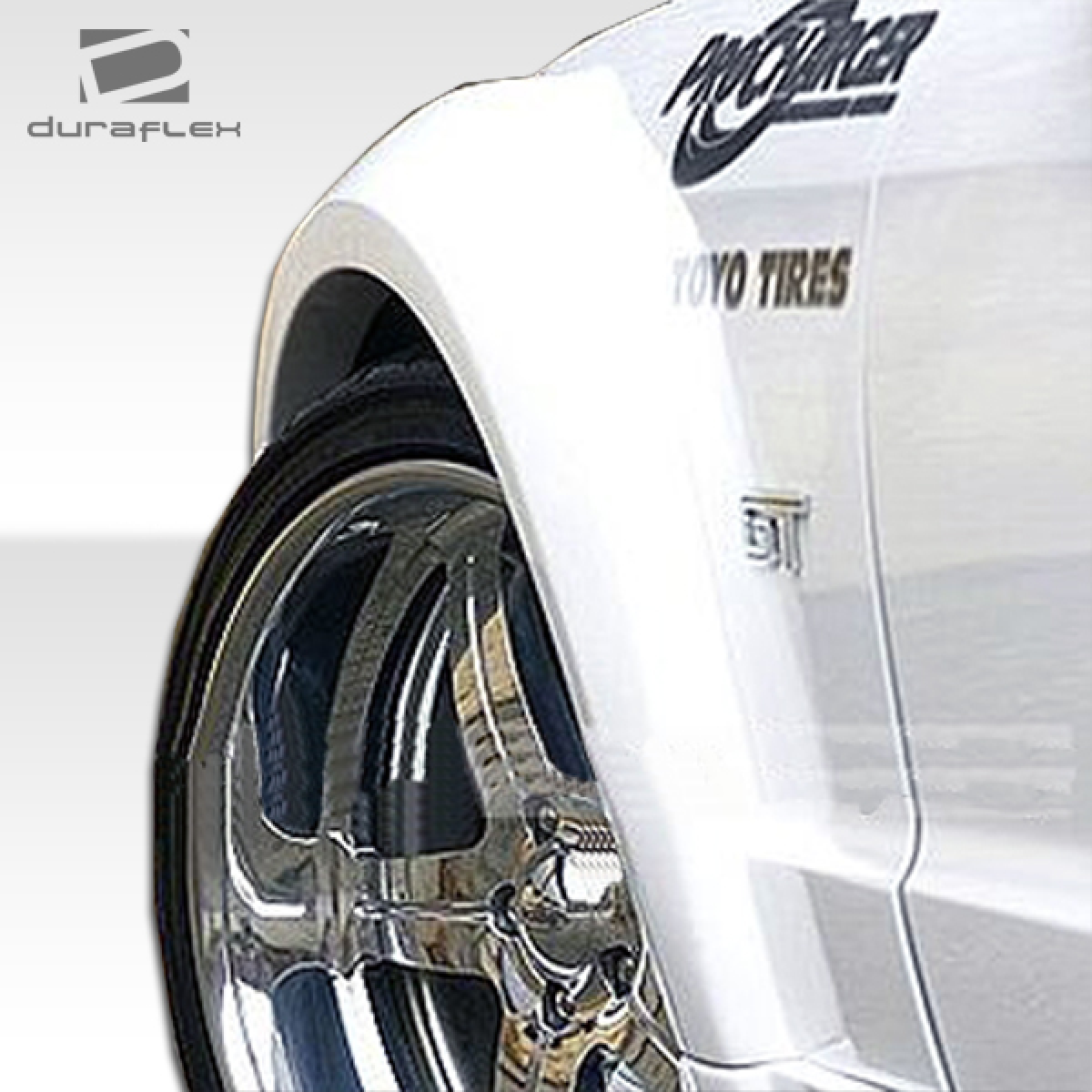 Modify your Ford Mustang 2005 with our Exterior/Fenders - Quarter view of fender and wheel at an angle