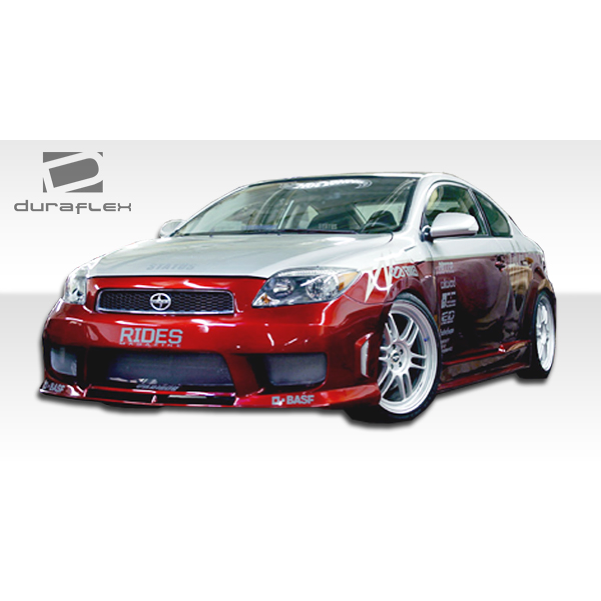 Modify your Scion tC 2005 with our Exterior/Front Bumpers or Lips - Front angle view of a modified vehicle