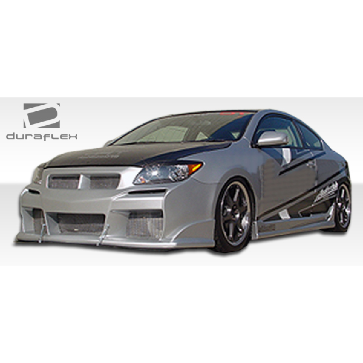 Modify your Scion tC 2005 with our Exterior/Front Bumpers or Lips - Front angle view of the vehicle showing bumper design