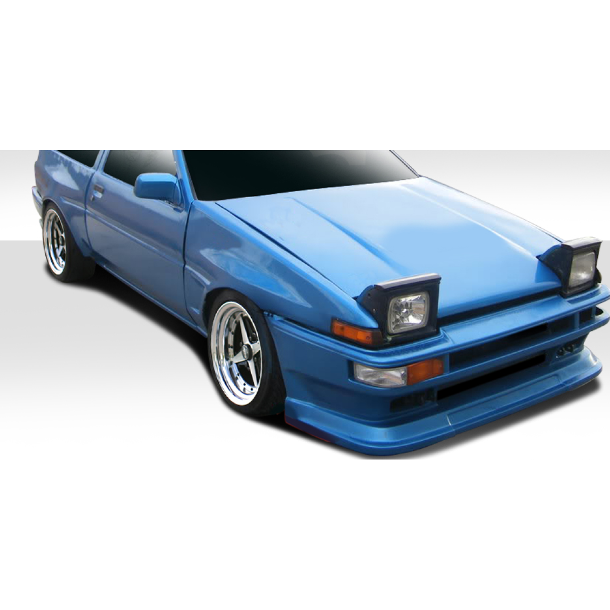 Modify your Toyota Corolla 1984 with our Exterior/Fenders - Part angle shows a low front perspective view