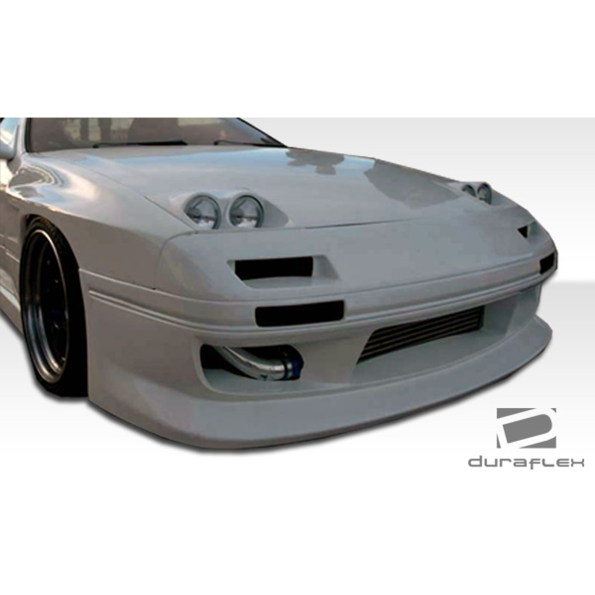 Modify your Mazda RX-7 1986 with our Exterior/Front Bumpers or Lips - Front view of the vehicle and its part