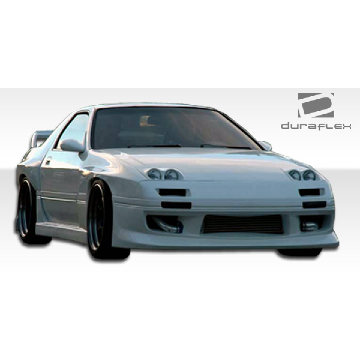 Modify your Mazda RX-7 1986 with our Exterior/Front Bumpers or Lips - Frontal angle view of bumper part