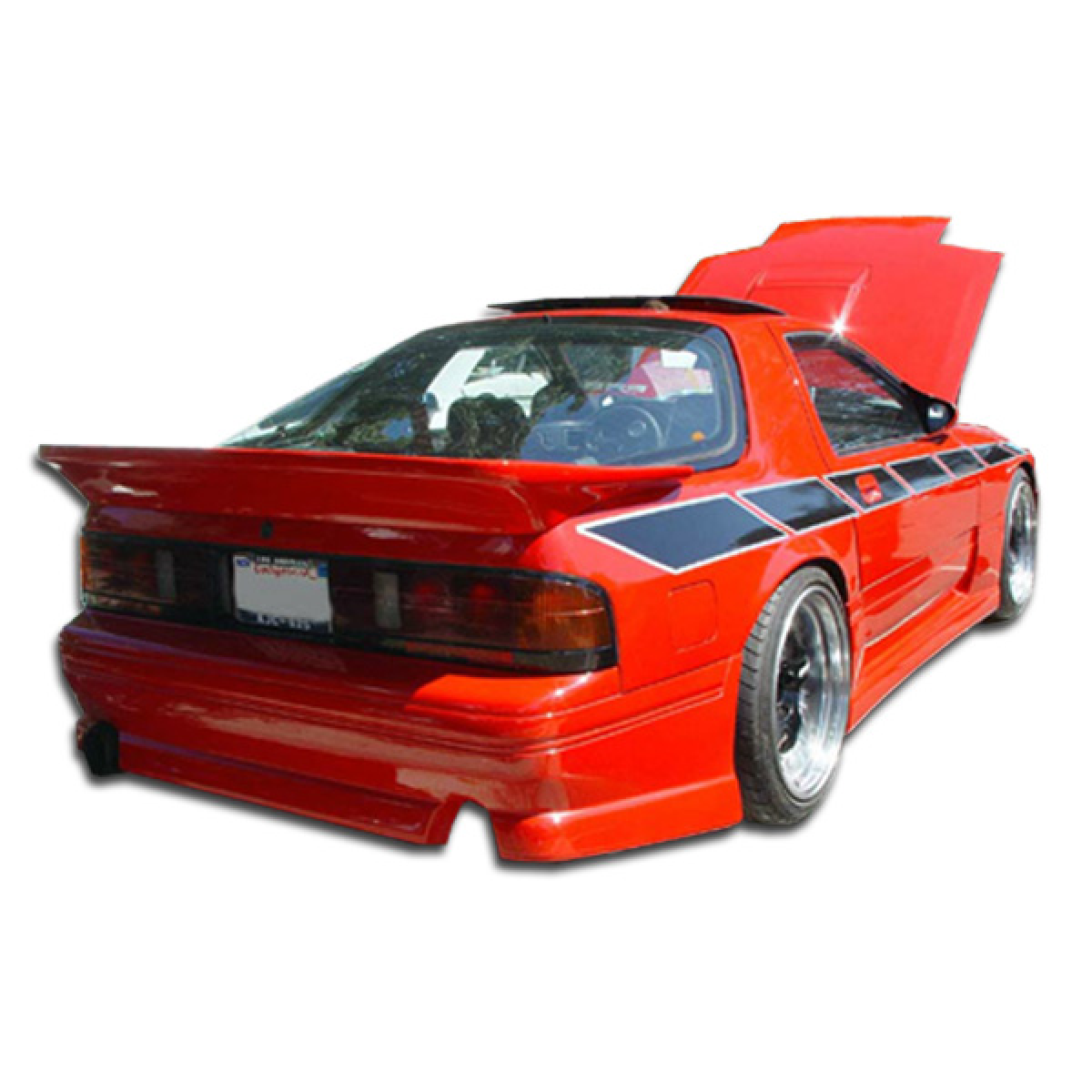 Modify your Mazda RX-7 1986 with our Exterior/Rear Bumpers or Lips - Rear angle view of the vehicle