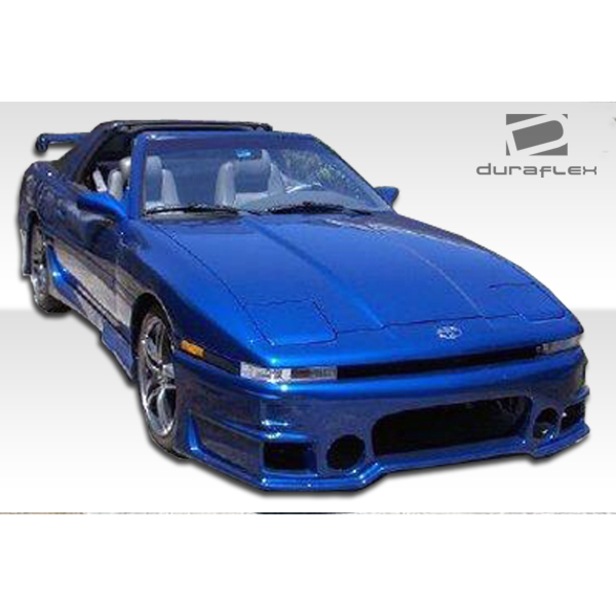 Modify your Toyota Supra 1986 with our Exterior/Side Skirts - Front three quarter view at an angle