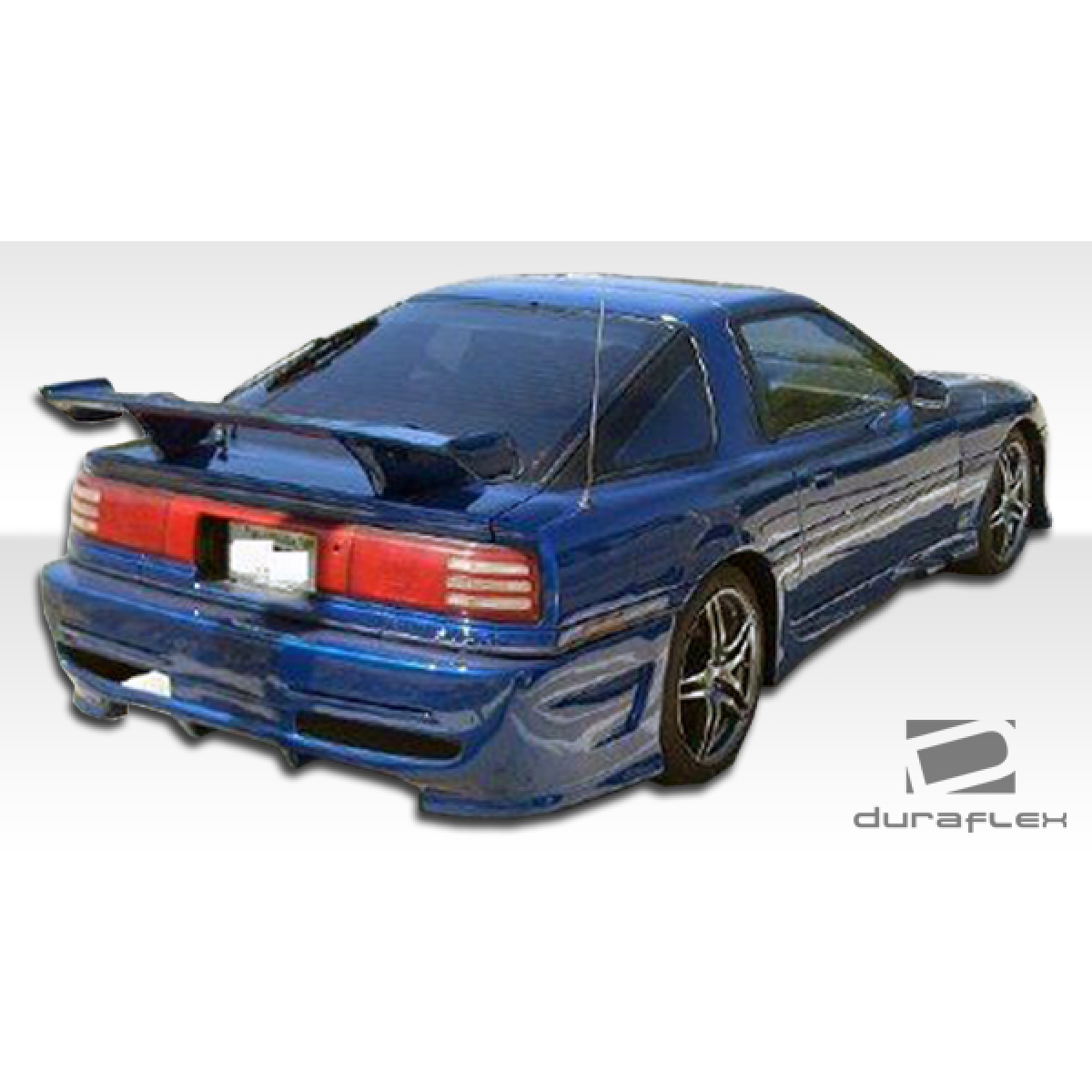 Modify your Toyota Supra 1986 with our Exterior/Side Skirts - Rear three quarter view of the vehicle