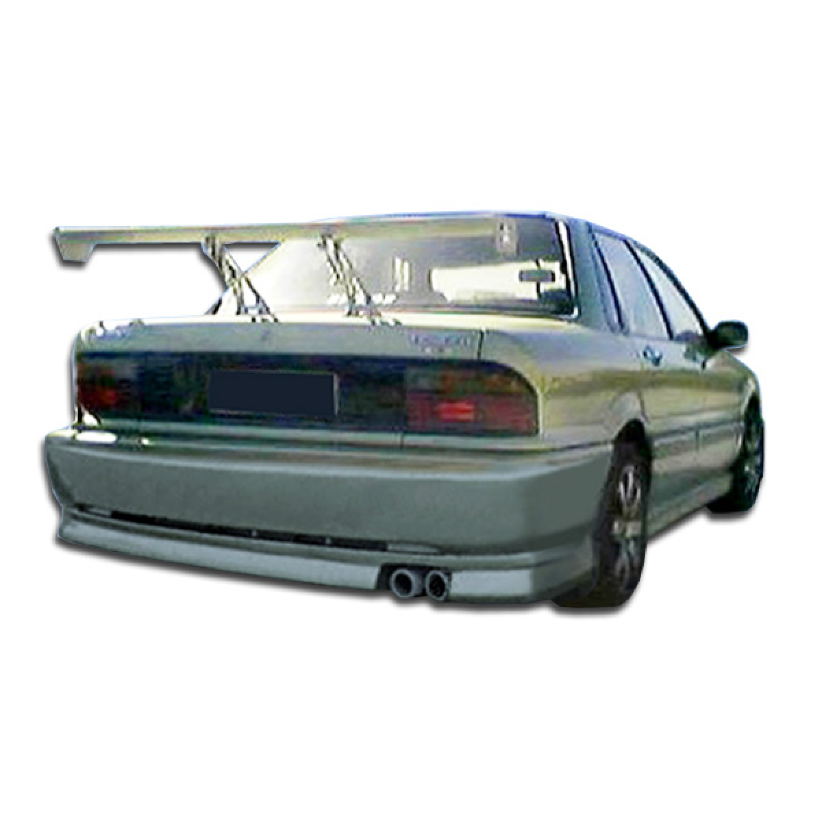 Modify your Mitsubishi Galant 1989 with our Exterior/Rear Bumpers or Lips - View from slightly above angled rear perspective