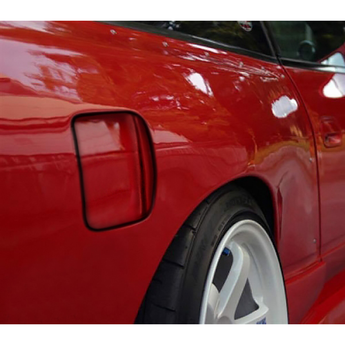 Modify your Nissan 240SX 1989 with our Exterior/Fenders - Angled close up of rear fender flare part