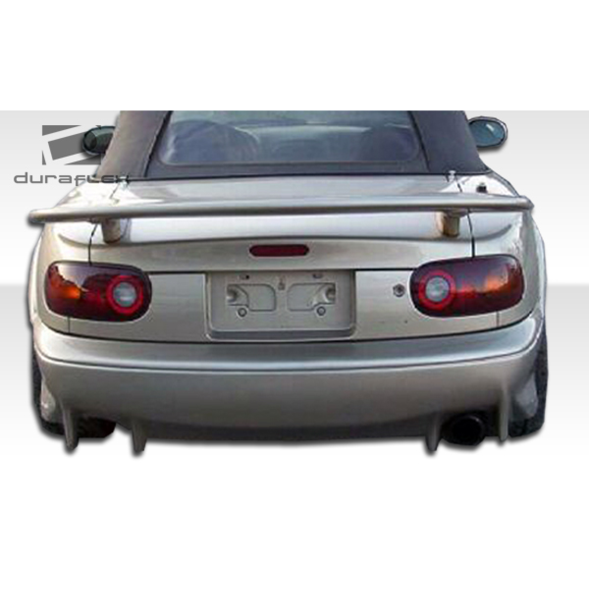 Modify your Mazda Miata 1990 with our Exterior/Rear Bumpers or Lips - Rear view angle of Mazda Miata visible