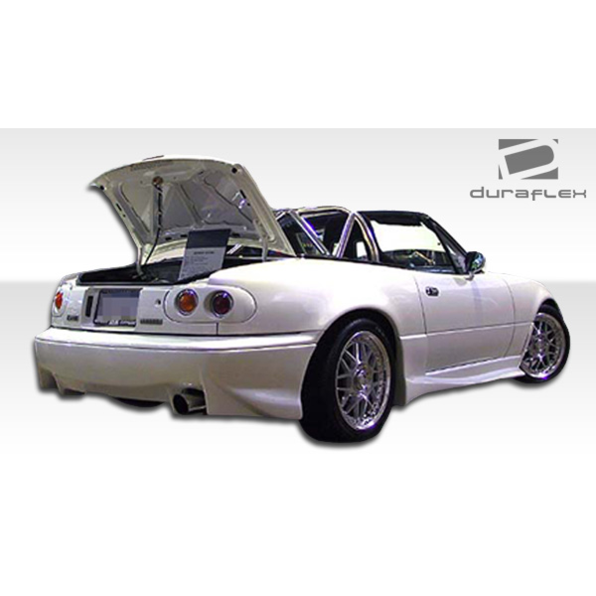 Modify your Mazda Miata 1990 with our Exterior/Side Skirts - Rear three quarter angle view of the car