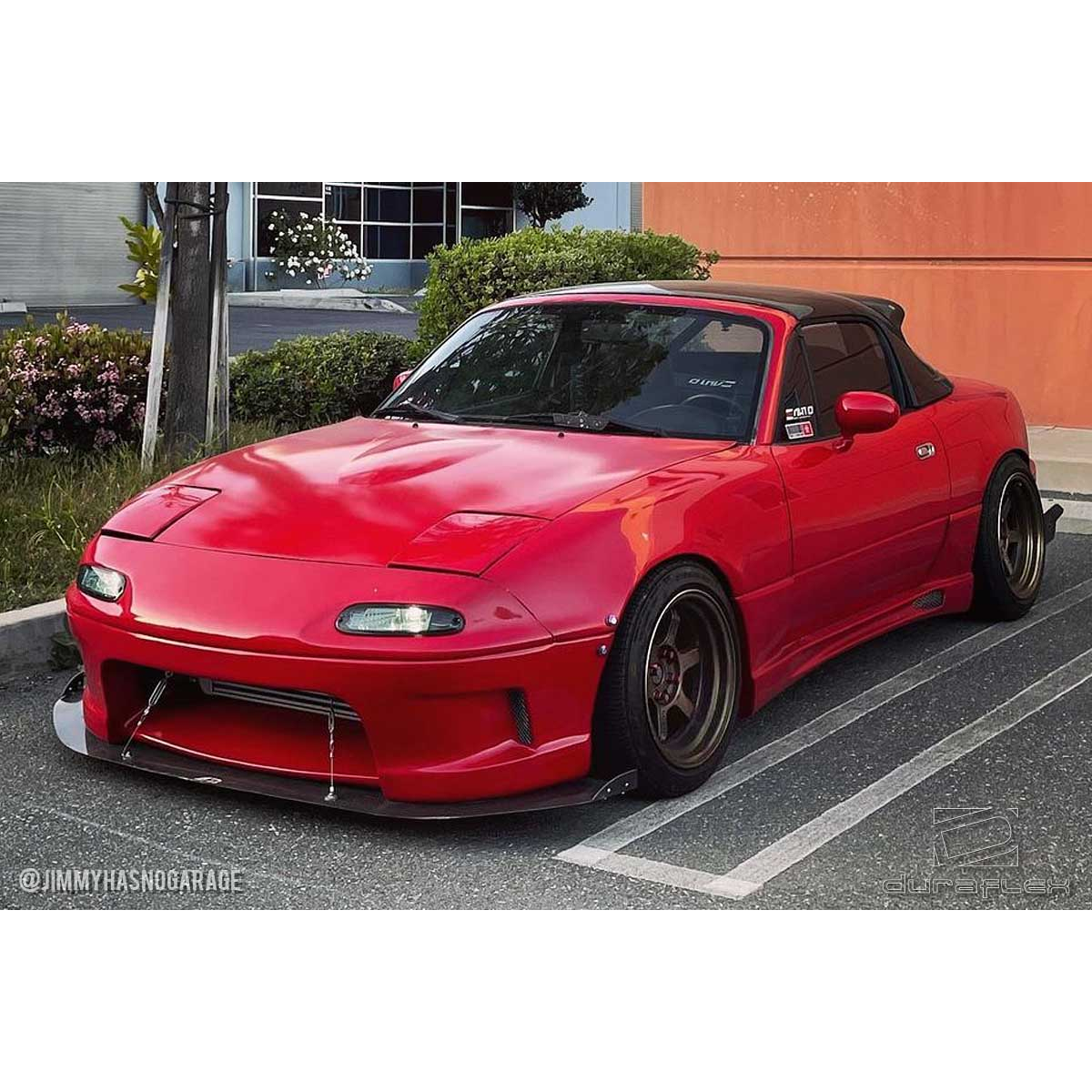 Modify your Mazda Miata 1990 with our Exterior/Front Bumpers or Lips - Front three quarters view of vehicle at slight angle