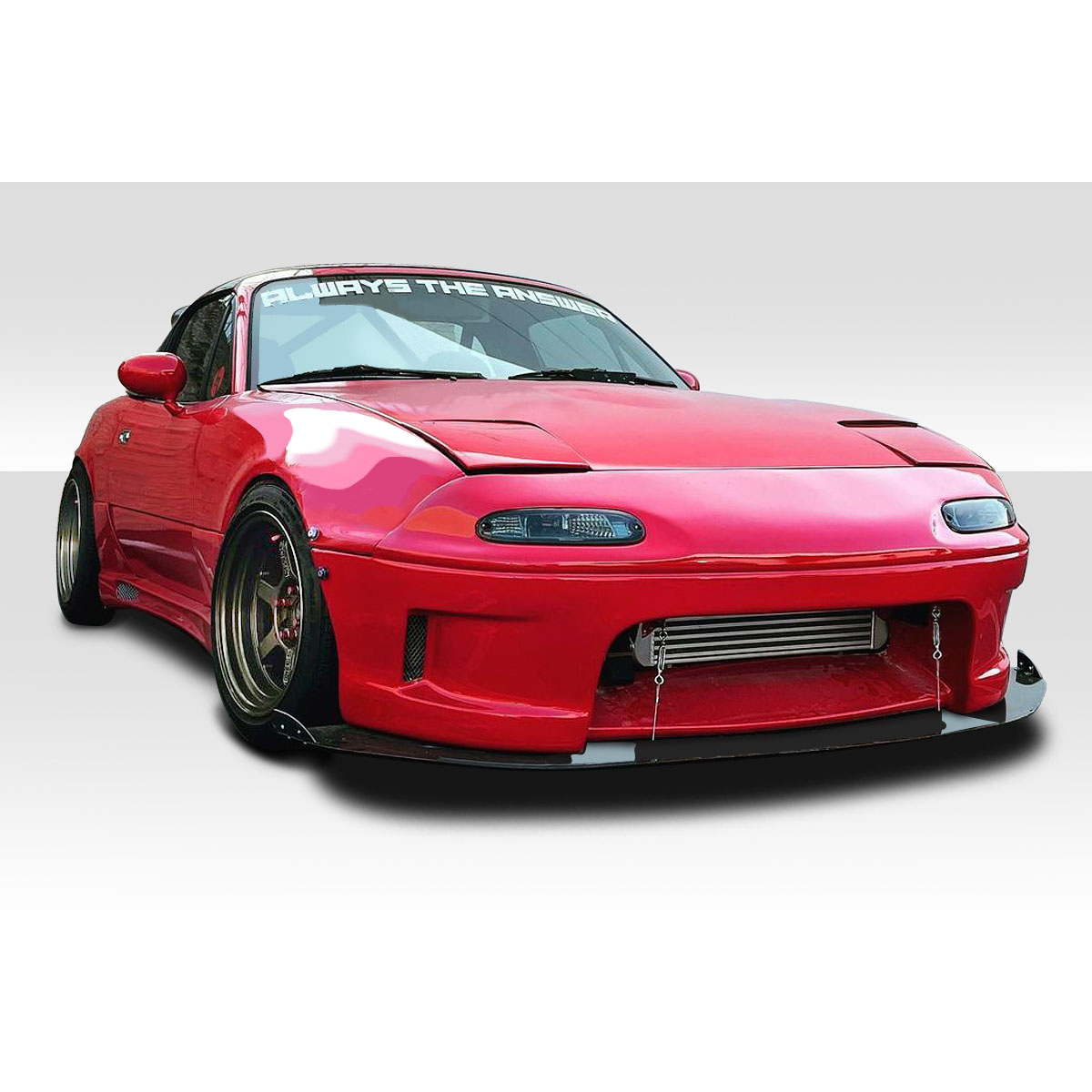 Modify your Mazda Miata 1990 with our Exterior/Front Bumpers or Lips - Front view of the car from a low angle