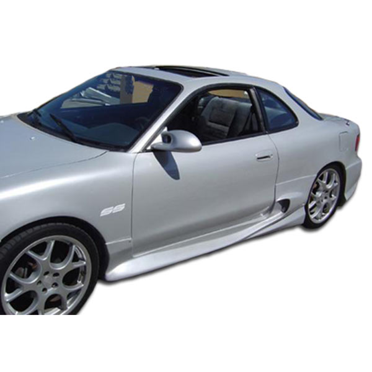 Modify your Toyota Celica 1990 with our Exterior/Complete Body Kits - Side angle view of vehicle part in image