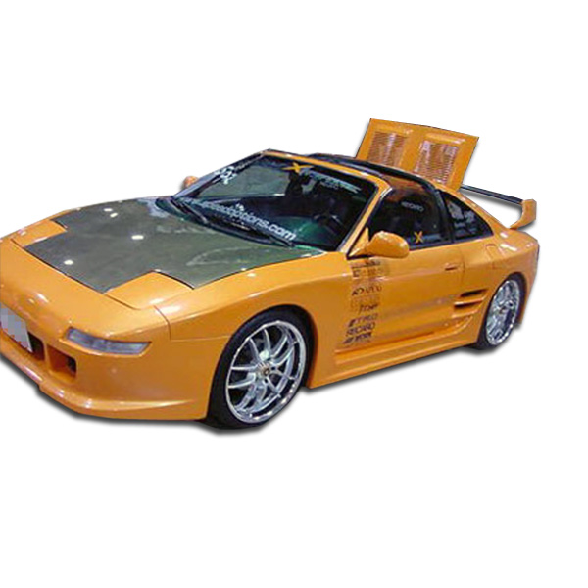 Modify your Toyota MR2 1991 with our Exterior/Other Exterior - Front angle view of car with a wide body gas cap