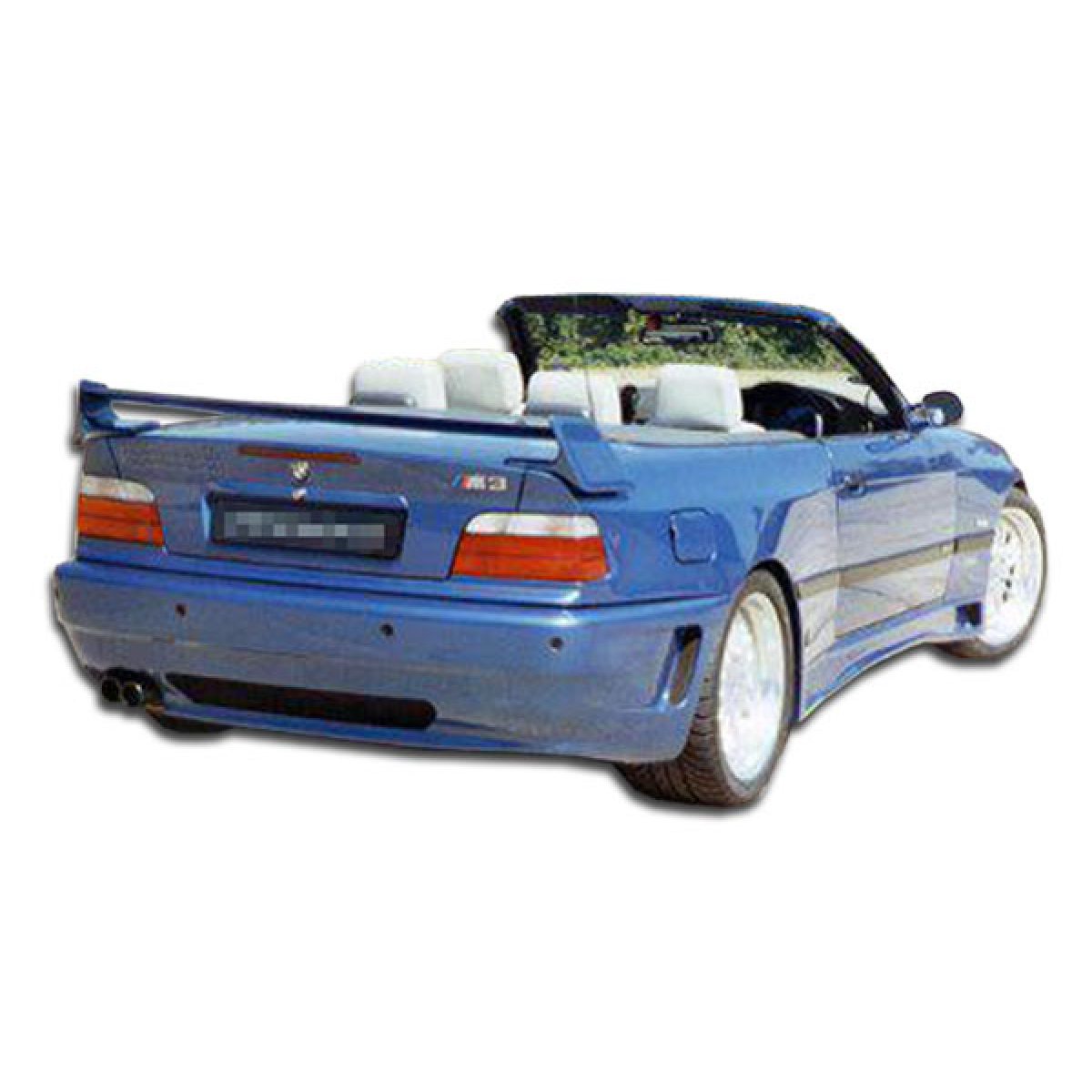 Modify your BMW 3-Series 1992 with our Exterior/Rear Bumpers - Rear view at a slight angle showing a sporty design