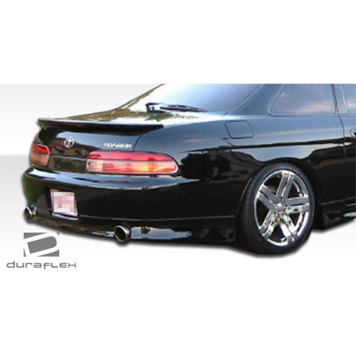 Modify your Lexus SC300 1992 with our Exterior/Rear Bumpers or Lips - Rear angle view of car showing bumper design