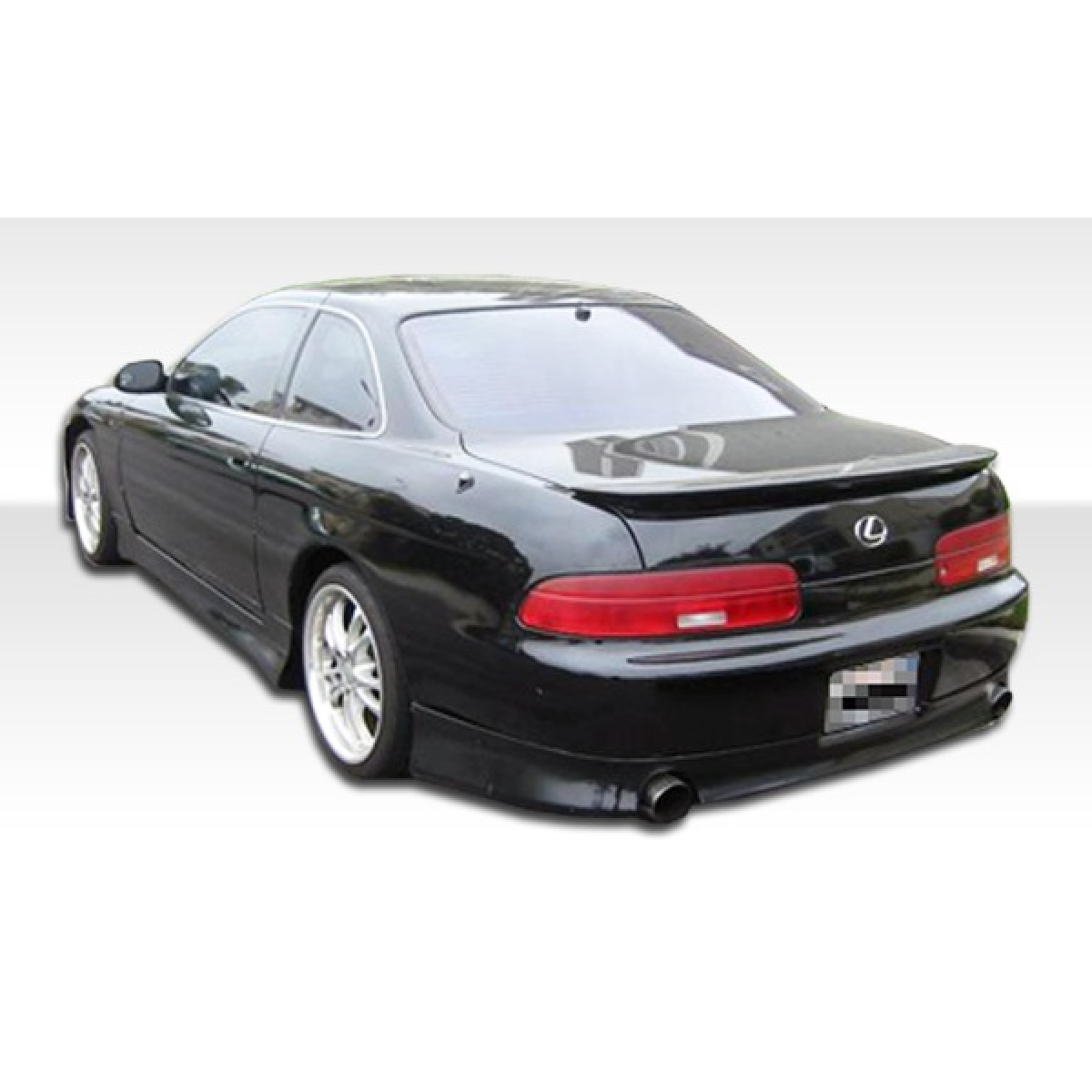 Modify your Lexus SC300 1992 with our Exterior/Rear Bumpers or Lips - View from a low rear angle highlighting the bumper