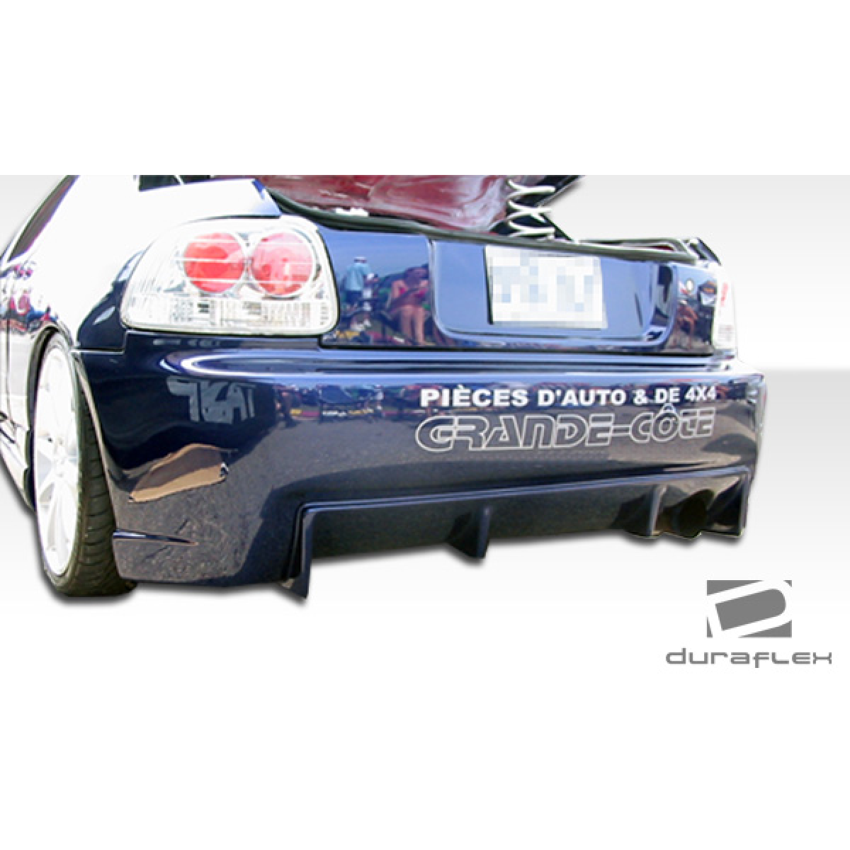 Modify your Honda Civic del Sol 1993 with our Exterior/Rear Bumpers or Lips - Rear view at a slight upward angle