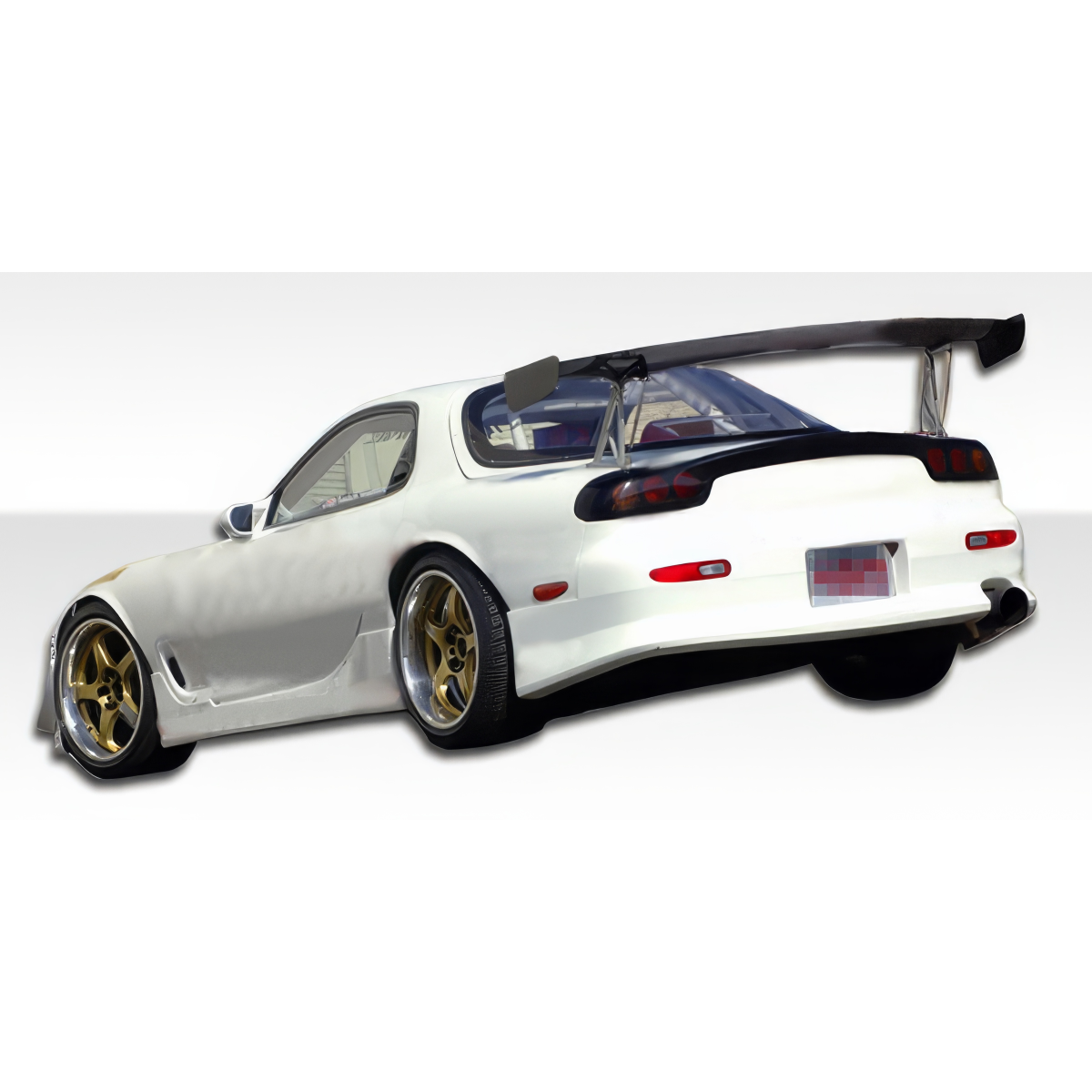 Modify your Mazda RX-7 1993 with our Exterior/Complete Body Kits - The image shows a rear three quarter view