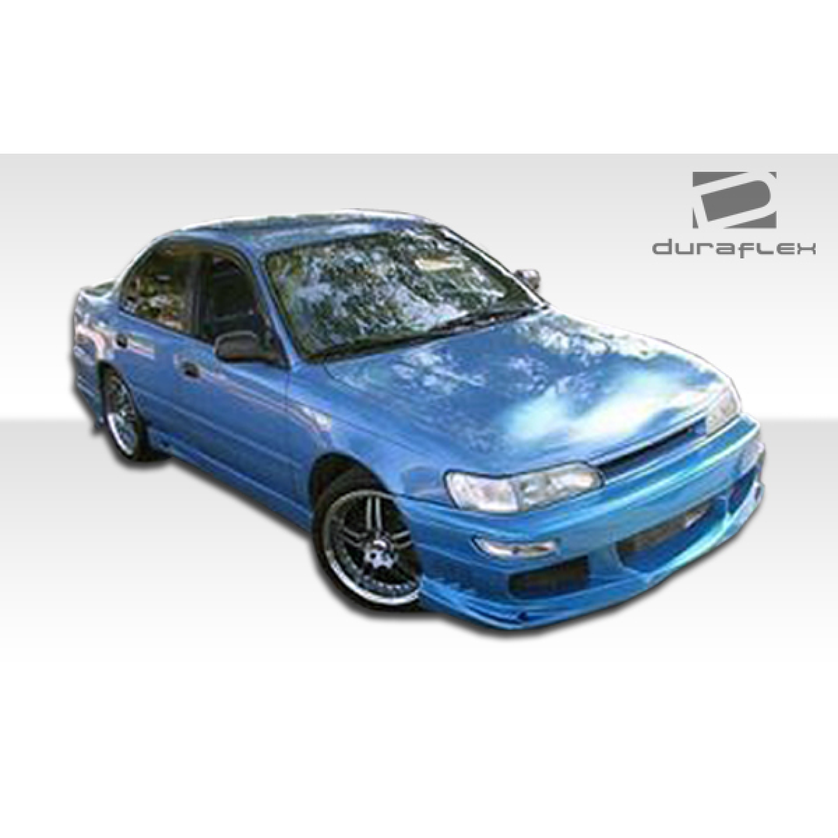 Modify your GEO Prizm 1993 with our Exterior/Complete Body Kits - Front angle view of a blue vehicle