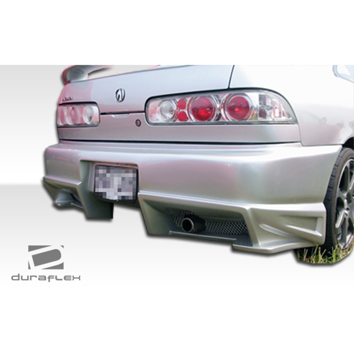 Modify your Acura Integra 1994 with our Exterior/Complete Body Kits - Low angle view of rear bumper part on vehicle