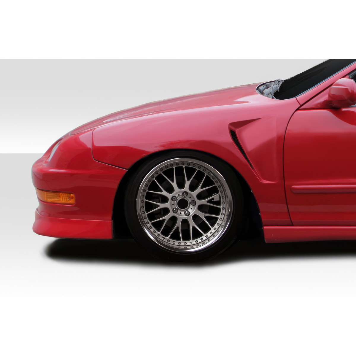 Modify your Acura Integra 1994 with our Exterior/Fenders - View shows side angle of fender part on vehicle