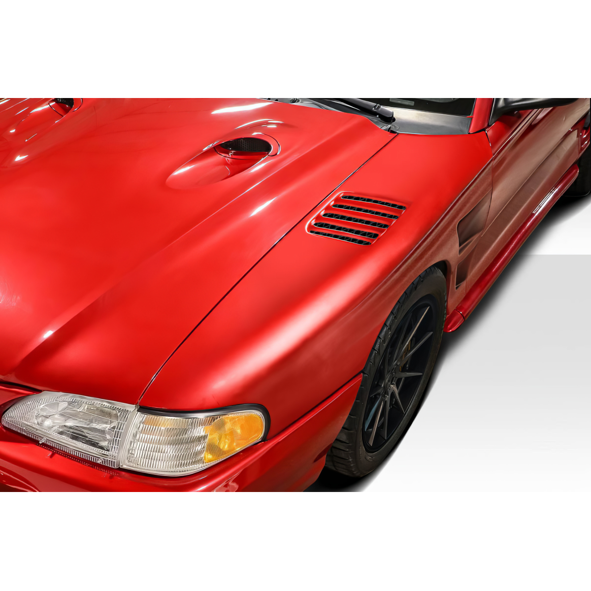 Modify your Ford Mustang 1994 with our Exterior/Fenders - Angled view of the fender and hood section