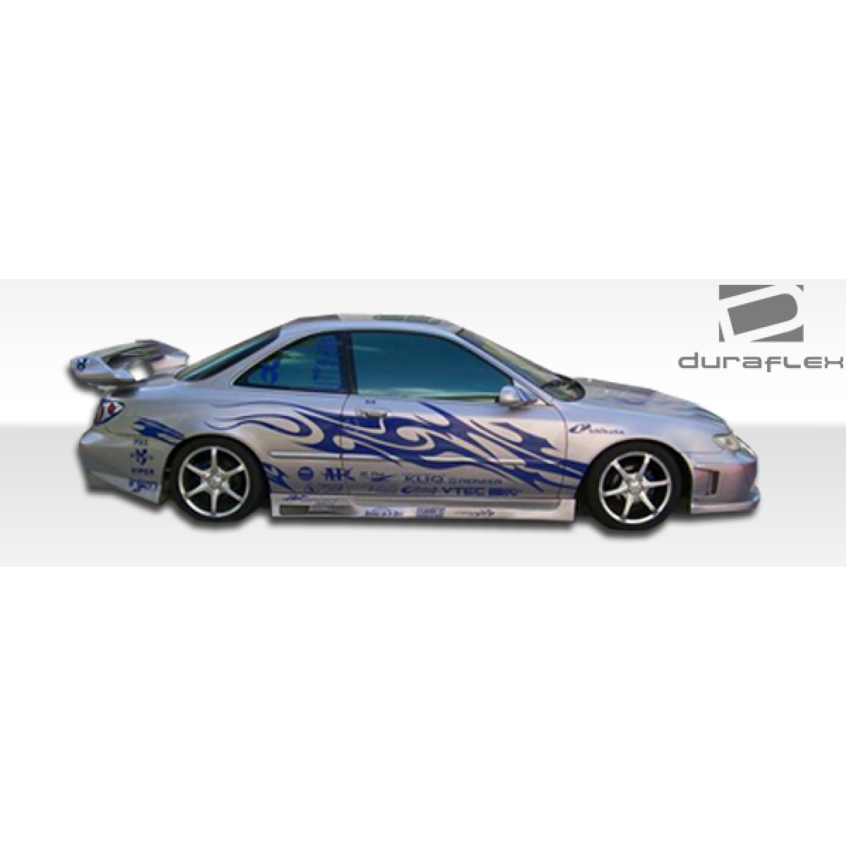 Modify your Acura CL 1994 with our Exterior/Side Skirts - The image shows the vehicle from a side angle