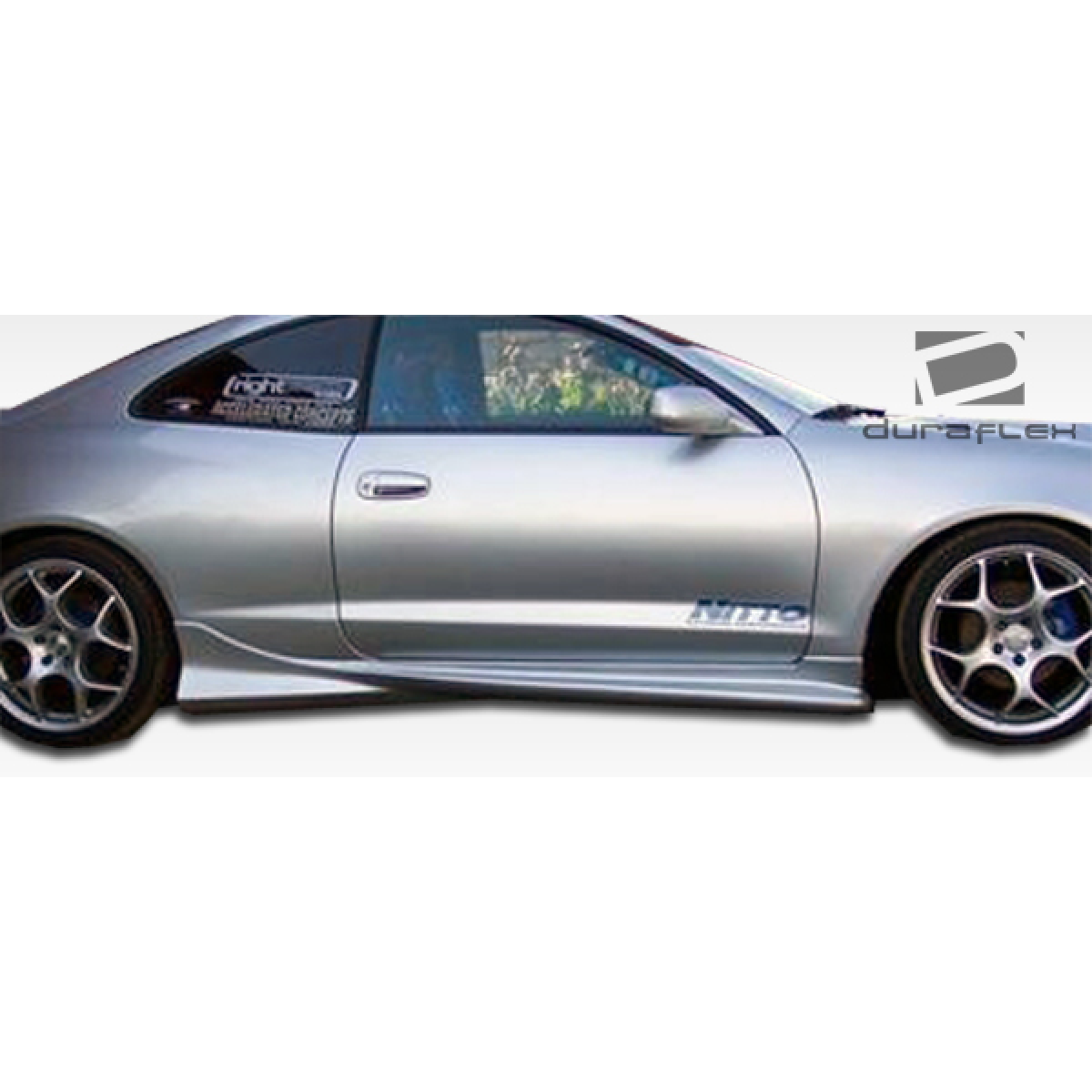 Modify your Toyota Celica 1994 with our Exterior/Side Skirts - Side angle view of vehicle part for aerodynamics