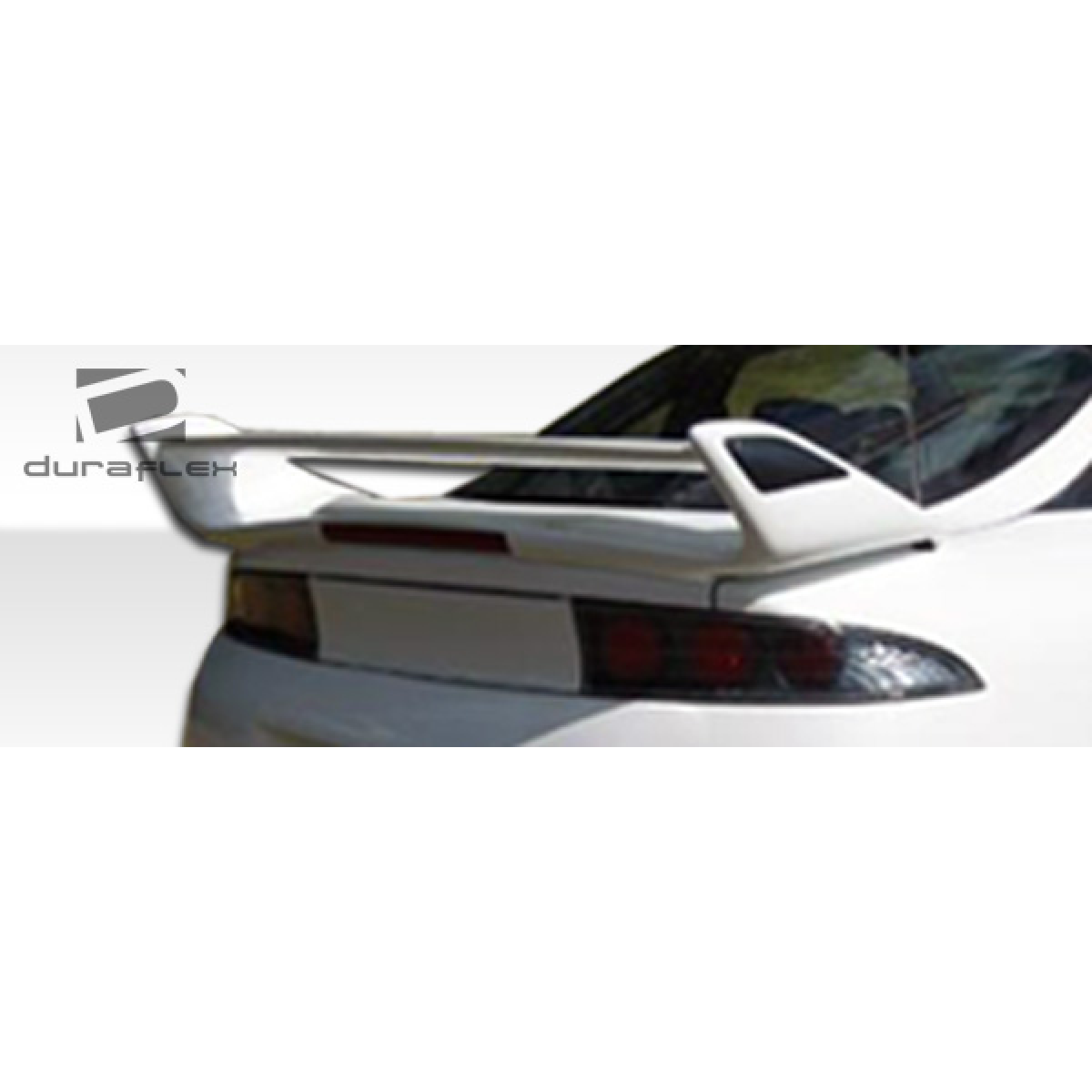 Modify your Eagle Talon 1995 with our Exterior/Wings - Rear angle of a car spoiler