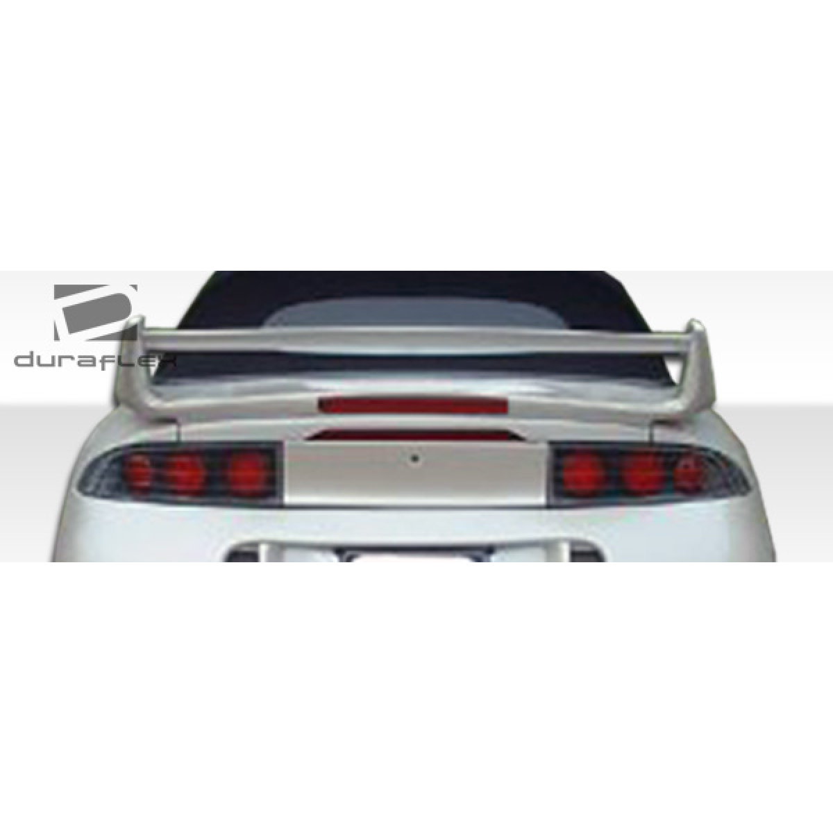 Modify your Eagle Talon 1995 with our Exterior/Wings - Rear angle view of car wing installation