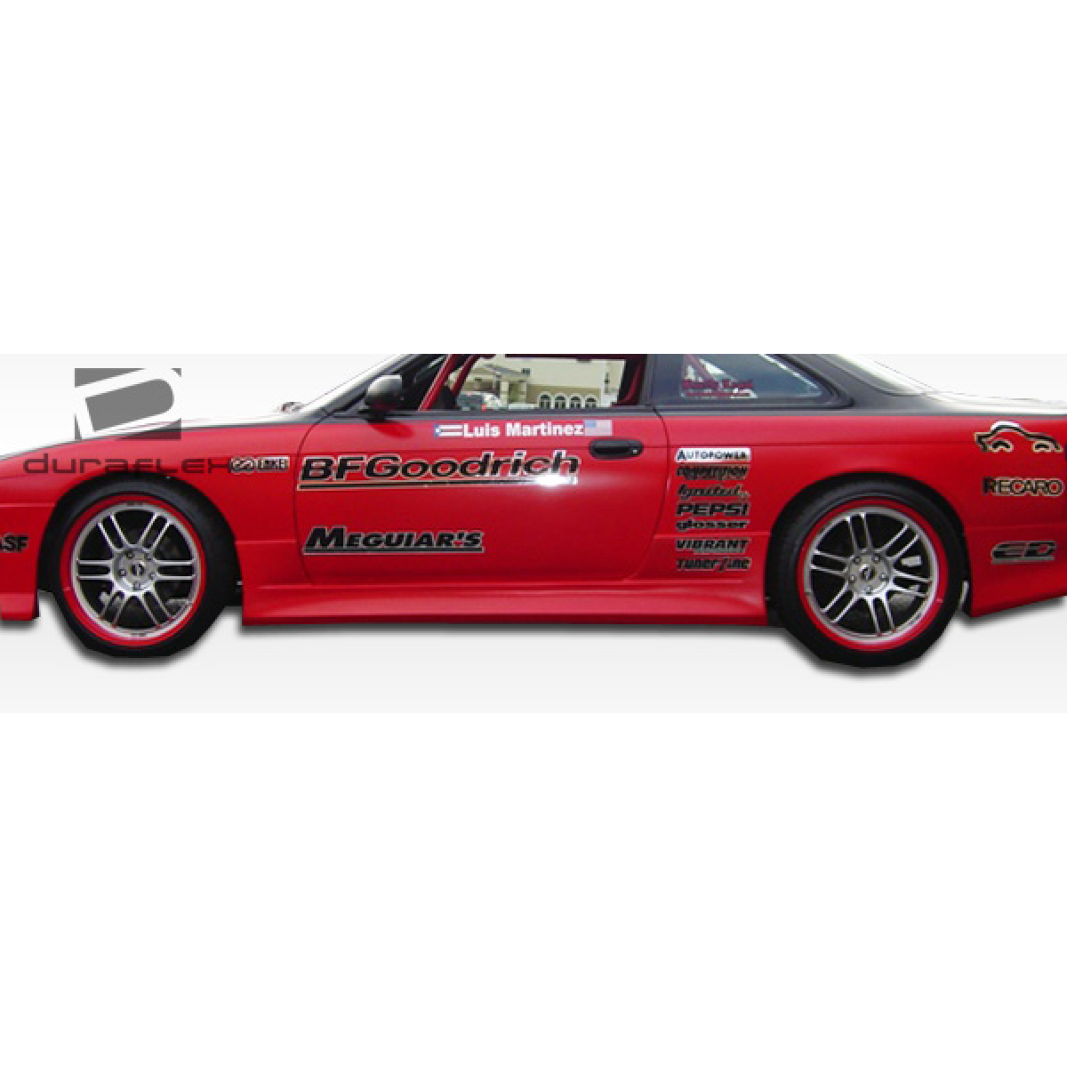 Modify your Nissan 240SX 1995 with our Exterior/Complete Body Kits - Side view of the car at a slight angle