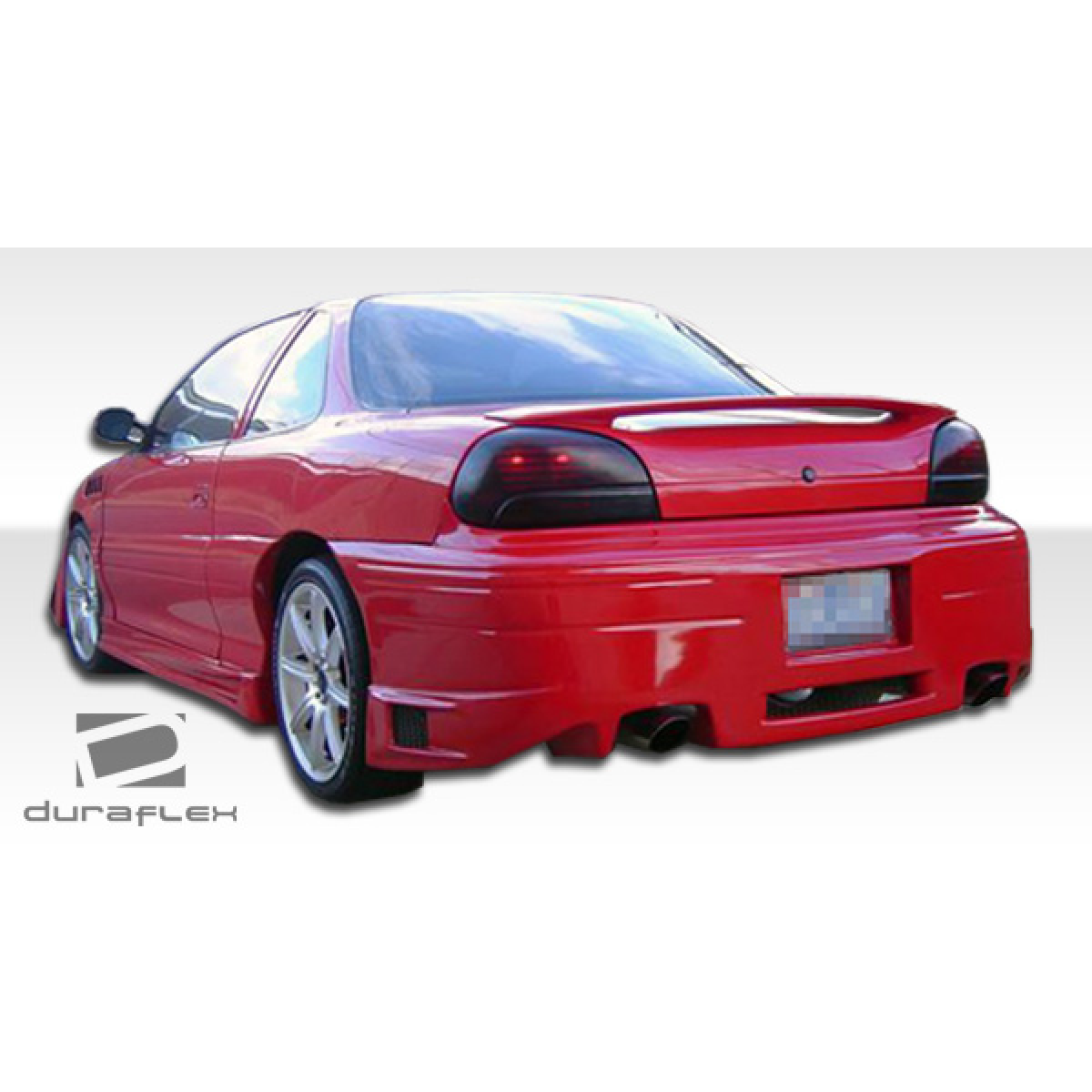 Modify your Pontiac Grand Am 1992 with our Exterior/Side Skirts - Rear angle view of a red Pontiac Grand Am