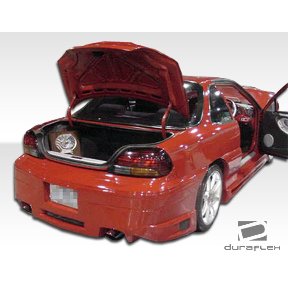 Modify your Pontiac Grand Am 1992 with our Exterior/Side Skirts - Rear three quarter angle view of a car trunk