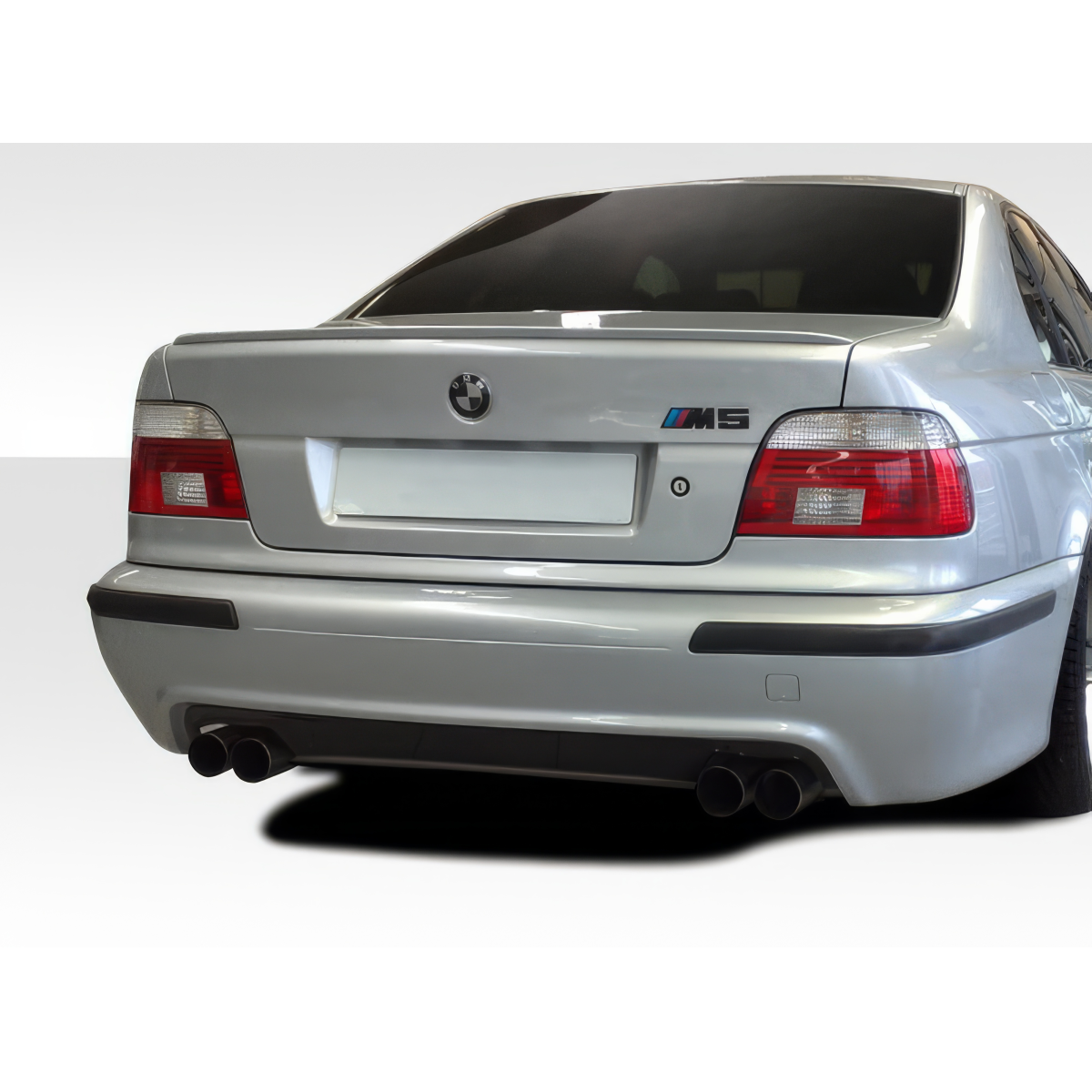 Modify your BMW 4-Series 1997 with our Exterior/Complete Body Kits - Rear angle showcasing bumper design and style