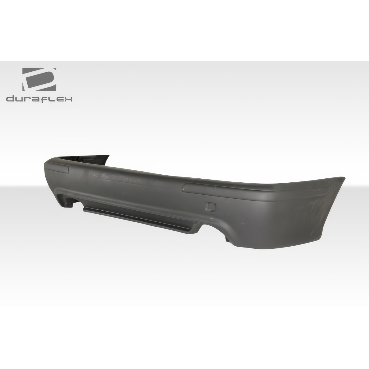 Modify your BMW 4-Series 1997 with our Exterior/Complete Body Kits - Side angle view of rear bumper part